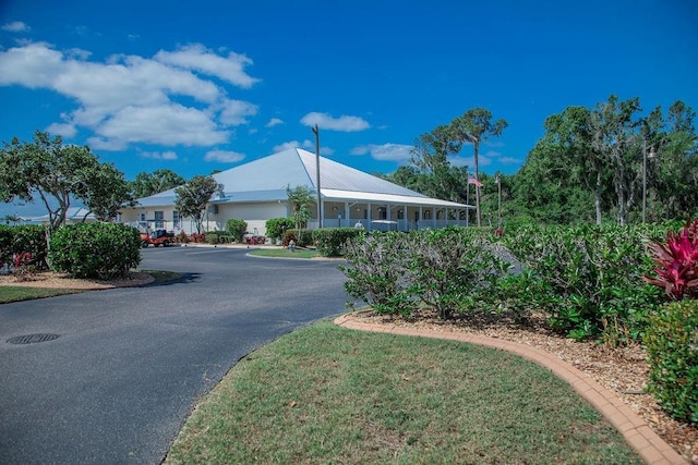 view of front of property with uncovered parking