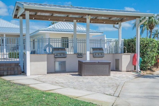 view of patio / terrace with a grill and exterior kitchen