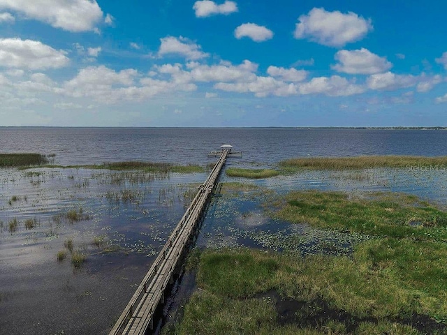 view of dock with a water view