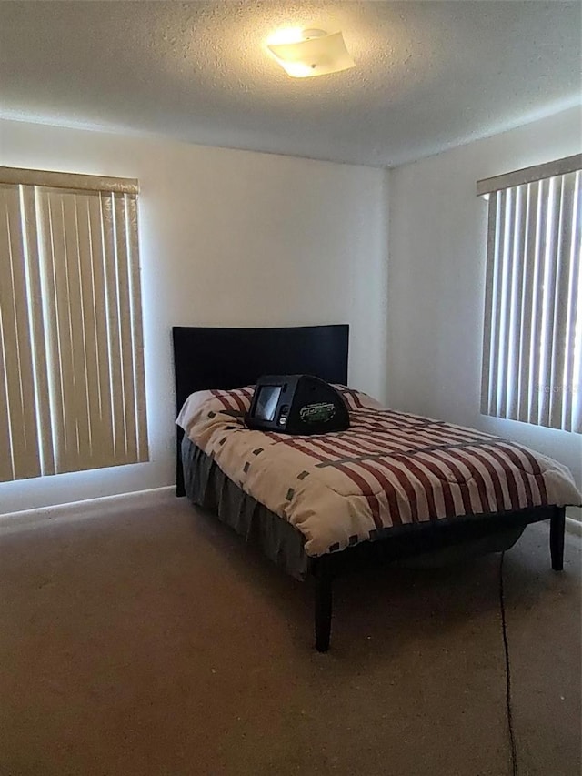 1402 Thousand Roses Dr W Unit 1402, Lake Wales, FL 33853 - bedroom with carpet floors