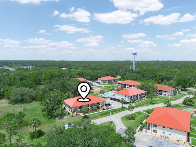 2809 Granada Ct Unit 5, Lake Wales, FL 33898 - drone / aerial view featuring a wooded view