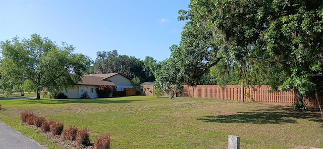 view of yard featuring fence