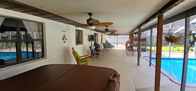 sunroom / solarium with a swimming pool