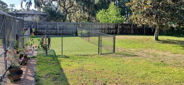 view of yard featuring a gate and fence