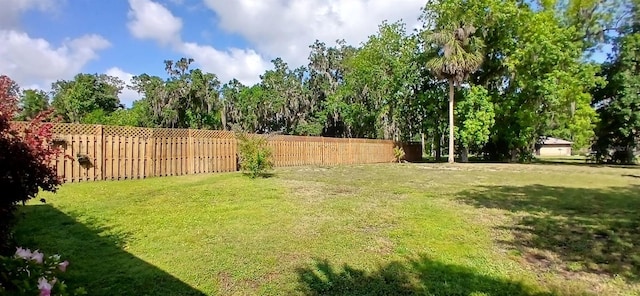 view of yard with fence