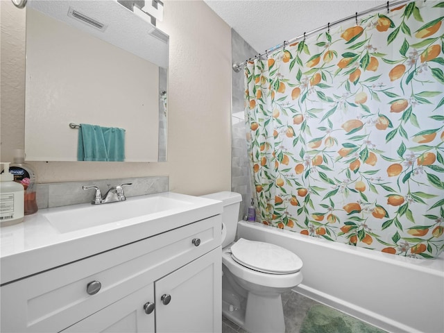 full bath featuring visible vents, vanity, toilet, a textured ceiling, and shower / tub combo