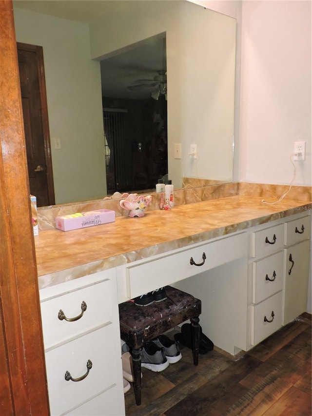 bathroom featuring vanity, a ceiling fan, and wood finished floors
