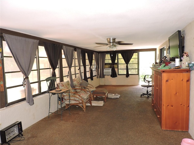 living room with carpet floors and a ceiling fan