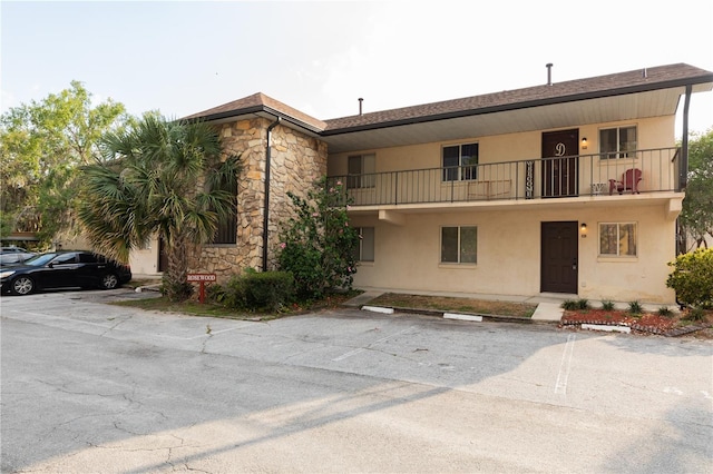 821 Orchid Springs Dr Unit 821, Winter Haven, FL 33884 - view of property featuring uncovered parking