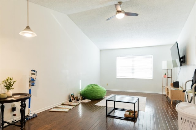 821 Orchid Springs Dr Unit 821, Winter Haven, FL 33884 - living room featuring ceiling fan, vaulted ceiling, and dark wood-style flooring