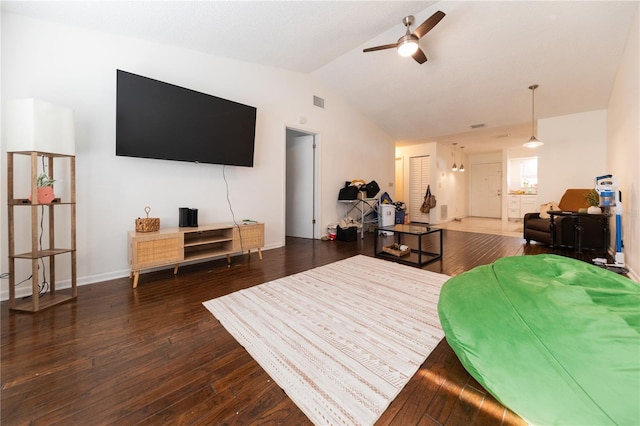 821 Orchid Springs Dr Unit 821, Winter Haven, FL 33884 - bedroom featuring hardwood / wood-style floors, vaulted ceiling, and baseboards