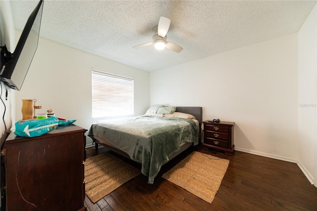 821 Orchid Springs Dr Unit 821, Winter Haven, FL 33884 - bedroom featuring hardwood / wood-style flooring, a textured ceiling, baseboards, and a ceiling fan