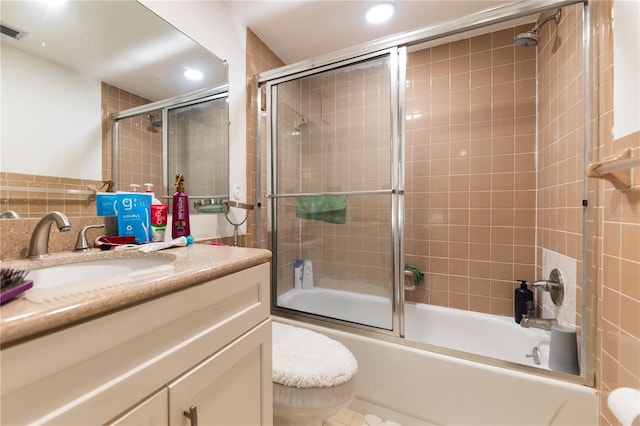 821 Orchid Springs Dr Unit 821, Winter Haven, FL 33884 - full bathroom with enclosed tub / shower combo, vanity, recessed lighting, and toilet