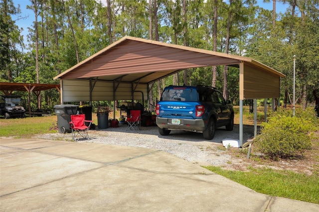 9365 Lemon Dr, Lake Wales, FL 33898 - view of car parking with a carport and concrete driveway