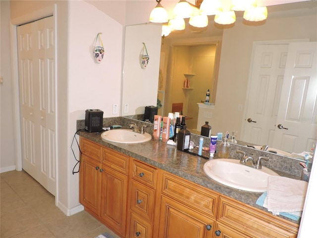 9365 Lemon Dr, Lake Wales, FL 33898 - full bath featuring tile patterned flooring, double vanity, and baseboards