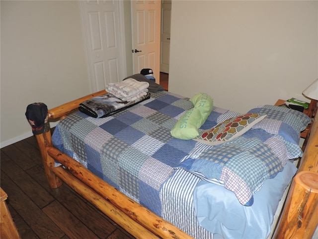 9365 Lemon Dr, Lake Wales, FL 33898 - bedroom with wood finished floors and baseboards