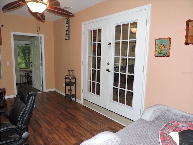 9365 Lemon Dr, Lake Wales, FL 33898 - office space with french doors, wood finished floors, ceiling fan, and baseboards