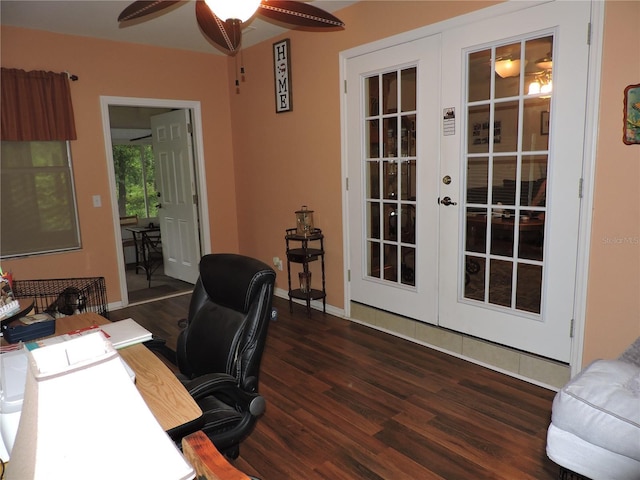9365 Lemon Dr, Lake Wales, FL 33898 - office with french doors, wood finished floors, ceiling fan, and baseboards