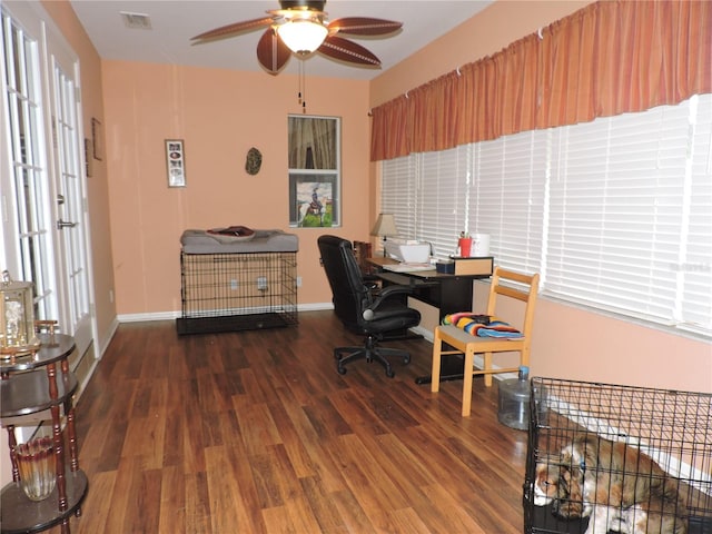 9365 Lemon Dr, Lake Wales, FL 33898 - office space featuring a ceiling fan, wood finished floors, and baseboards