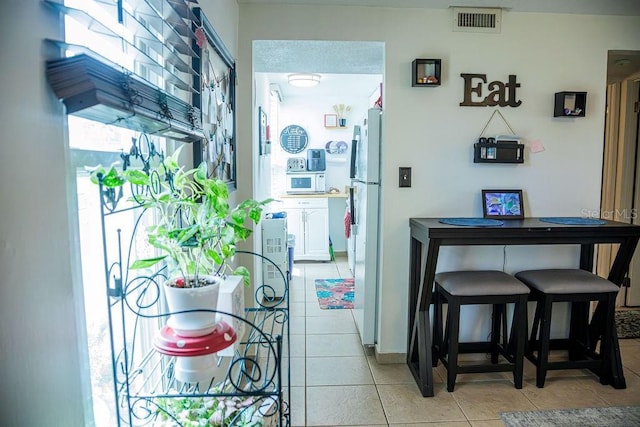 3041 Club Cir, Lake Wales, FL 33898 - corridor with light tile patterned flooring