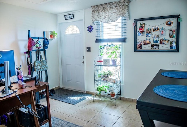 3041 Club Cir, Lake Wales, FL 33898 - foyer featuring tile patterned floors and baseboards