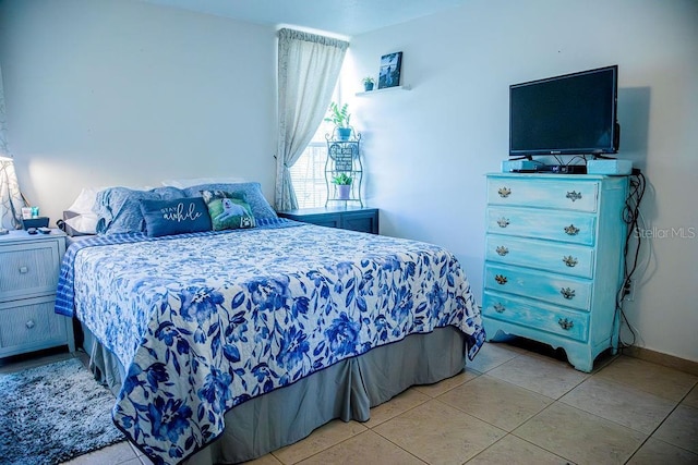 3041 Club Cir, Lake Wales, FL 33898 - tiled bedroom featuring baseboards