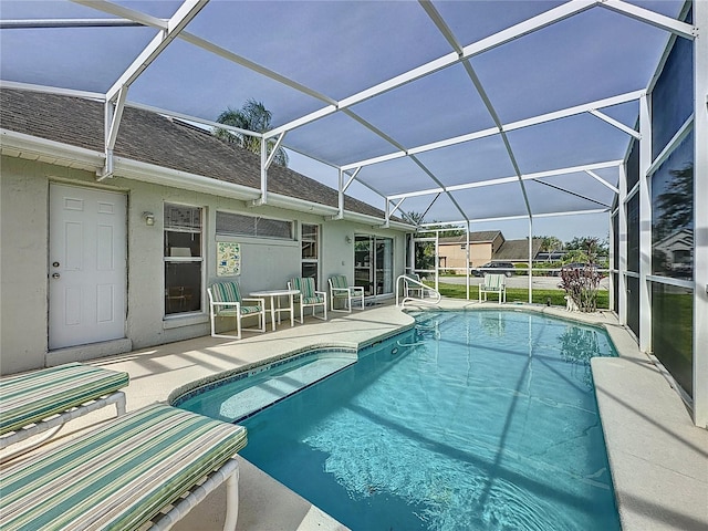 2200 Mallory Cir, Haines City, FL 33844 - swimming pool with a patio area and a lanai