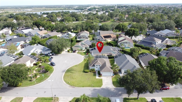 2200 Mallory Cir, Haines City, FL 33844 - aerial view of property's location featuring nearby suburban area and a nearby body of water