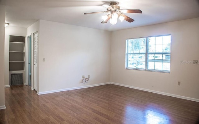 4725 Kayworth Rd, Lake Wales, FL 33898 - unfurnished room with wood finished floors, ceiling fan, and baseboards