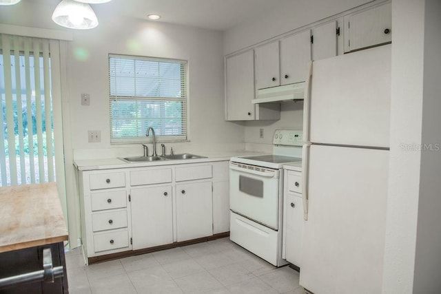 4725 Kayworth Rd, Lake Wales, FL 33898 - kitchen with white appliances, a sink, light countertops, under cabinet range hood, and recessed lighting
