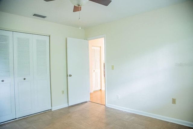 4725 Kayworth Rd, Lake Wales, FL 33898 - unfurnished bedroom with a closet, baseboards, and a ceiling fan