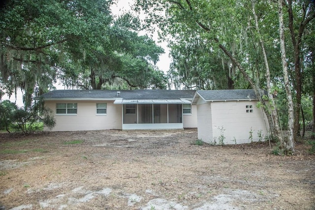4725 Kayworth Rd, Lake Wales, FL 33898 - rear view of property with a sunroom
