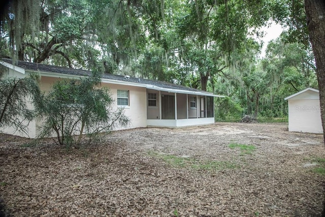 4725 Kayworth Rd, Lake Wales, FL 33898 - back of house featuring a sunroom