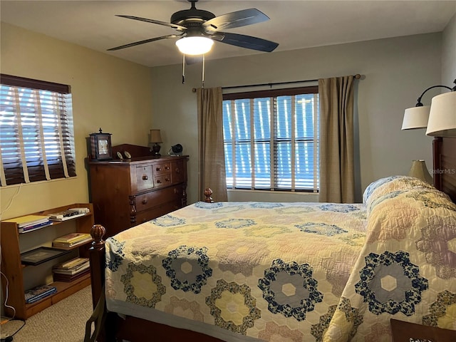 1422 Ave H SW, Winter Haven, FL 33880 - bedroom featuring multiple windows, a ceiling fan, and carpet flooring