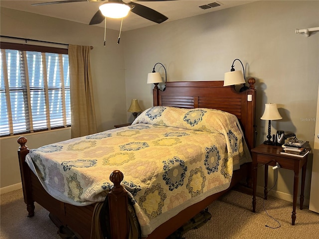 1422 Ave H SW, Winter Haven, FL 33880 - bedroom with carpet, baseboards, and a ceiling fan