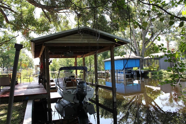 1422 Ave H SW, Winter Haven, FL 33880 - dock area with boat lift and a water view
