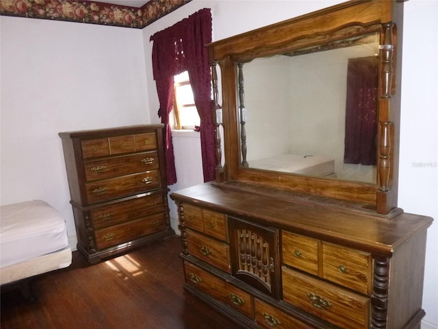302 S Palm Ave, Frostproof, FL 33843 - bedroom featuring dark wood finished floors