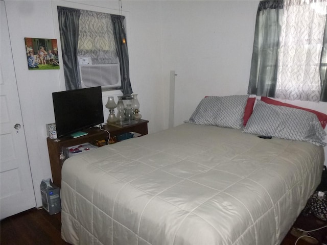 302 S Palm Ave, Frostproof, FL 33843 - bedroom featuring wood finished floors