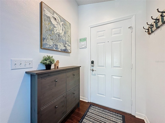 2696 Hemingway Ave, Haines City, FL 33844 - entrance foyer featuring dark wood-style floors