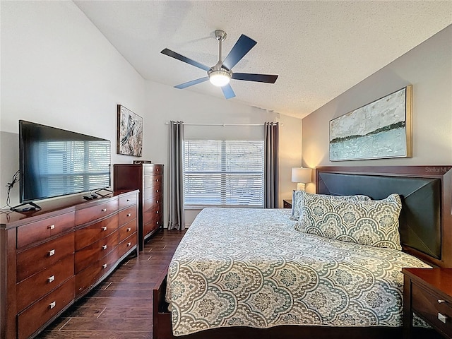 2696 Hemingway Ave, Haines City, FL 33844 - bedroom featuring lofted ceiling, dark wood-style floors, a textured ceiling, and a ceiling fan