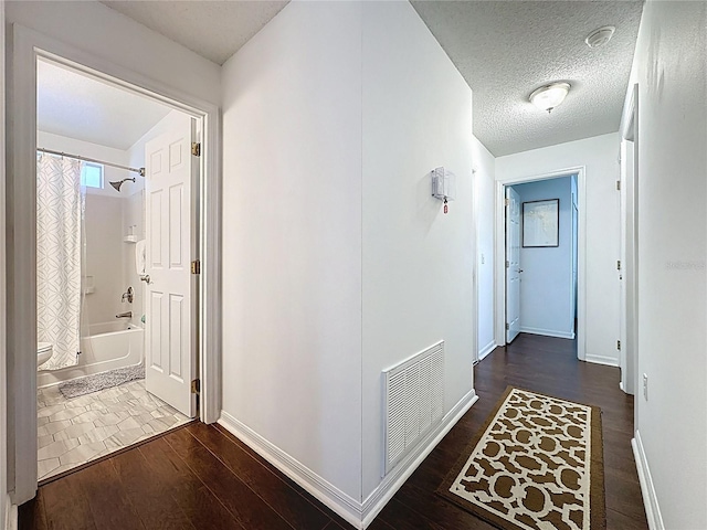 2696 Hemingway Ave, Haines City, FL 33844 - hallway with wood finished floors and baseboards
