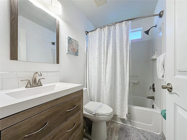 2696 Hemingway Ave, Haines City, FL 33844 - full bathroom with vanity, shower / bath combo with shower curtain, and tile patterned flooring