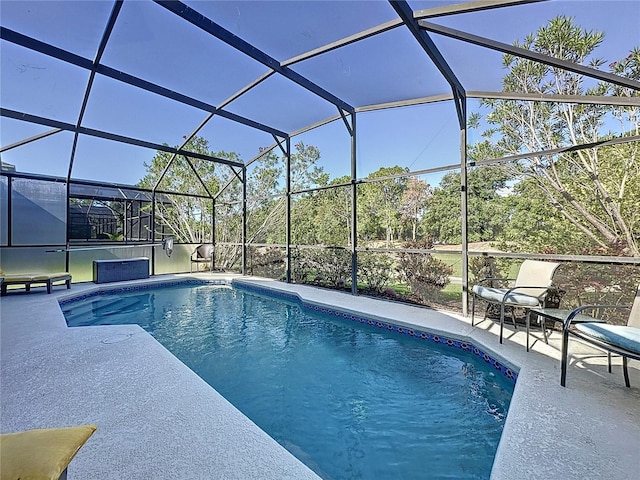 2696 Hemingway Ave, Haines City, FL 33844 - outdoor pool with a patio area and glass enclosure