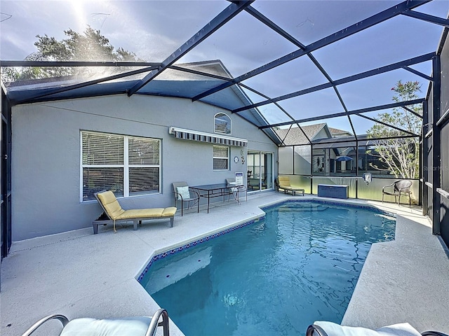 2696 Hemingway Ave, Haines City, FL 33844 - swimming pool featuring a patio area and glass enclosure