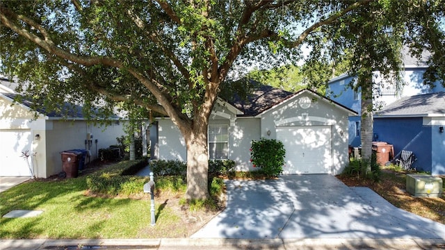 2696 Hemingway Ave, Haines City, FL 33844 - single story home with a garage, driveway, stucco siding, and a front lawn
