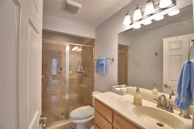 10 Armbruster Ct, Frostproof, FL 33843 - bathroom with vanity, a stall shower, a textured wall, and a textured ceiling