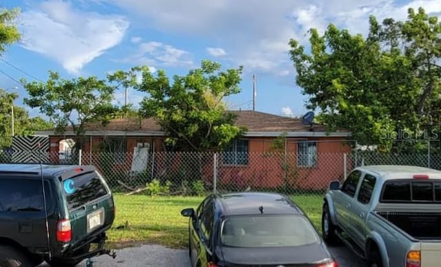 view of front of property with a front lawn