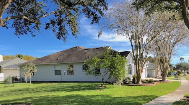 exterior space featuring a lawn