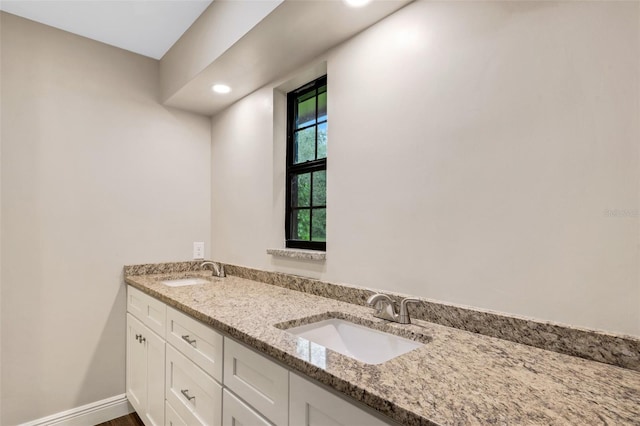 bathroom featuring double sink vanity