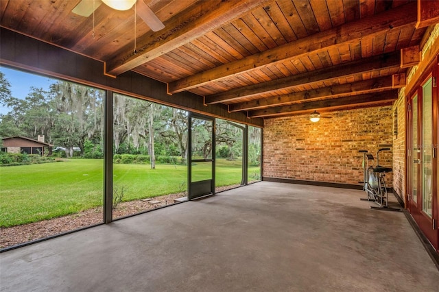 unfurnished sunroom with beam ceiling, wooden ceiling, and ceiling fan